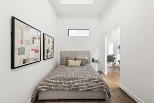 Package #1-730 2 Avenue Sw, Calgary, AB - Indoor Photo Showing Bedroom