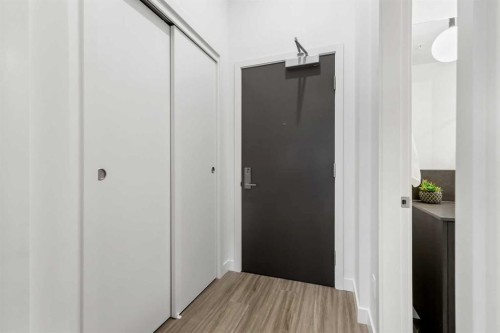 Package #1-730 2 Avenue Sw, Calgary, AB - Indoor Photo Showing Other Room