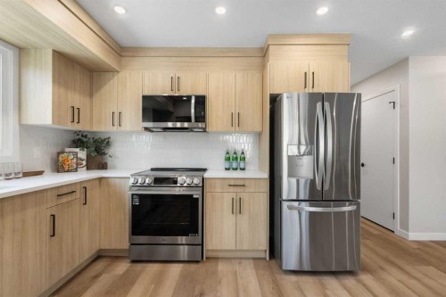 198 Silver Brook Road Nw, Calgary, AB - Indoor Photo Showing Kitchen With Stainless Steel Kitchen