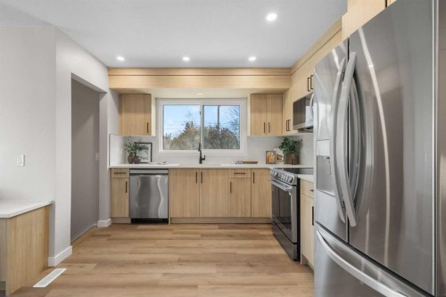 198 Silver Brook Road Nw, Calgary, AB - Indoor Photo Showing Kitchen With Stainless Steel Kitchen With Upgraded Kitchen