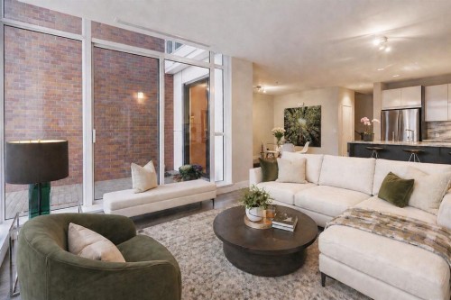 119 Confluence Mews Se, Calgary, AB - Indoor Photo Showing Living Room