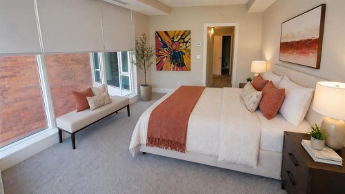 119 Confluence Mews Se, Calgary, AB - Indoor Photo Showing Bedroom