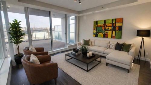 119 Confluence Mews Se, Calgary, AB - Indoor Photo Showing Living Room