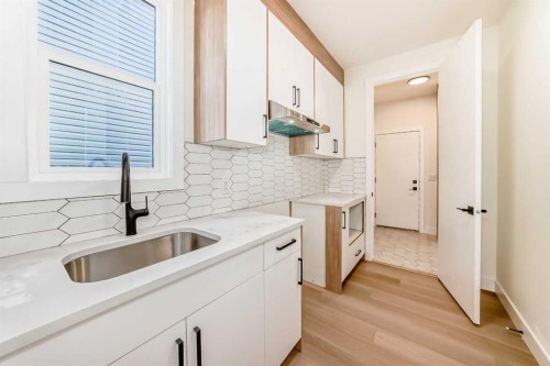 379 Rivercrest Road, Cochrane, AB - Indoor Photo Showing Kitchen