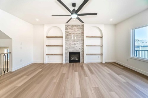 379 Rivercrest Road, Cochrane, AB - Indoor Photo Showing Living Room With Fireplace