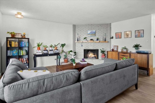 20 Brampton Crescent Sw, Calgary, AB - Indoor Photo Showing Living Room With Fireplace