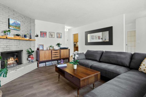 20 Brampton Crescent Sw, Calgary, AB - Indoor Photo Showing Living Room With Fireplace