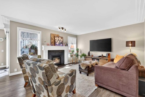 280 Mt Selkirk Close Se, Calgary, AB - Indoor Photo Showing Living Room With Fireplace