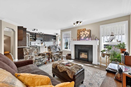 280 Mt Selkirk Close Se, Calgary, AB - Indoor Photo Showing Living Room With Fireplace