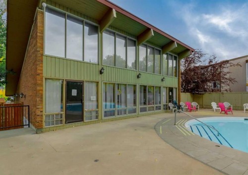 607-8948 Elbow Drive Sw, Calgary, AB - Outdoor With In Ground Pool