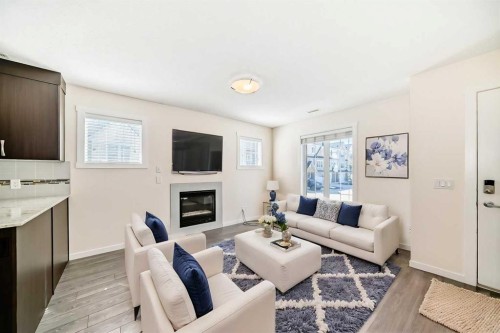 204 Auburn Bay Circle Se, Calgary, AB - Indoor Photo Showing Living Room With Fireplace