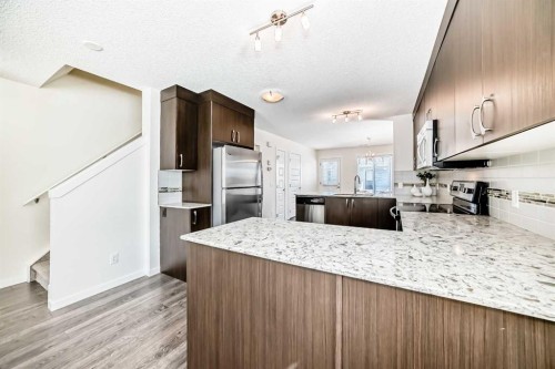 204 Auburn Bay Circle Se, Calgary, AB - Indoor Photo Showing Kitchen With Upgraded Kitchen
