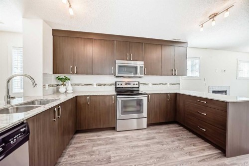 204 Auburn Bay Circle Se, Calgary, AB - Indoor Photo Showing Kitchen With Stainless Steel Kitchen With Double Sink With Upgraded Kitchen