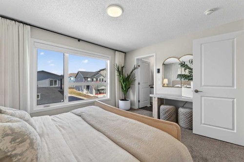 16 Belmont Place Sw, Calgary, AB - Indoor Photo Showing Bedroom