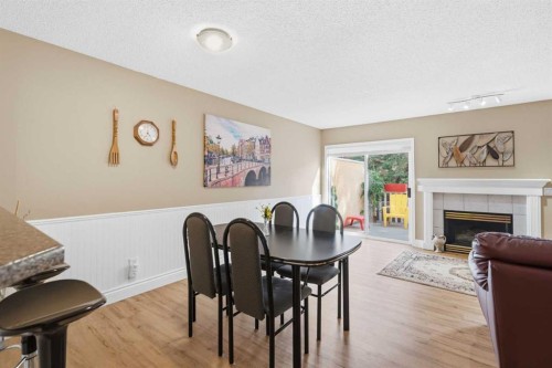 55 Cedarview Mews Sw, Calgary, AB - Indoor With Fireplace