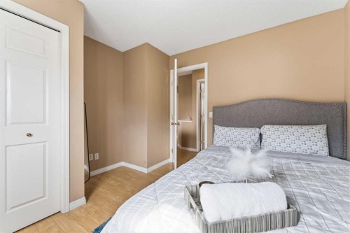 21 Panamount Crescent Nw, Calgary, AB - Indoor Photo Showing Bedroom