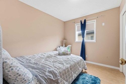 21 Panamount Crescent Nw, Calgary, AB - Indoor Photo Showing Bedroom