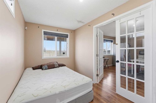 21 Panamount Crescent Nw, Calgary, AB - Indoor Photo Showing Bedroom