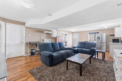 21 Panamount Crescent Nw, Calgary, AB - Indoor Photo Showing Living Room