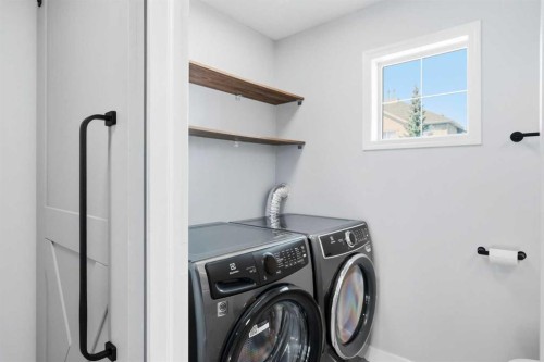 337 Copperfield Boulevard Se, Calgary, AB - Indoor Photo Showing Laundry Room