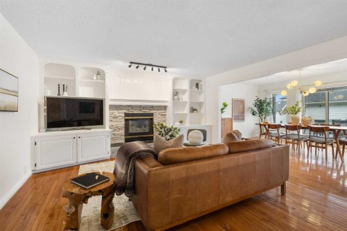 66 Inverness Close Se, Calgary, AB - Indoor Photo Showing Living Room With Fireplace