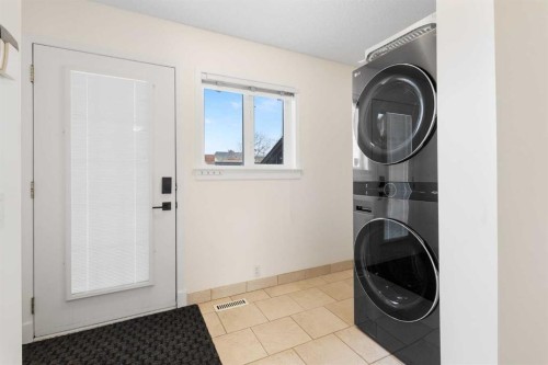 66 Inverness Close Se, Calgary, AB - Indoor Photo Showing Laundry Room