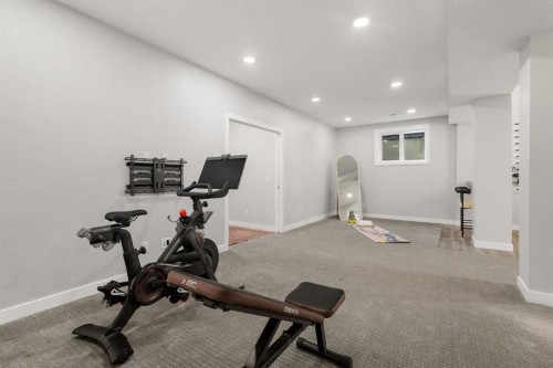 66 Inverness Close Se, Calgary, AB - Indoor Photo Showing Gym Room