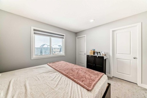 33 Savanna Manor Ne, Calgary, AB - Indoor Photo Showing Bedroom