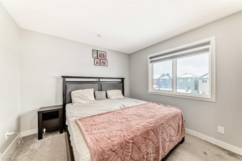 33 Savanna Manor Ne, Calgary, AB - Indoor Photo Showing Bedroom