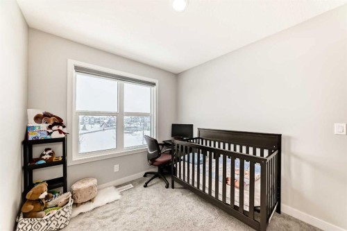 33 Savanna Manor Ne, Calgary, AB - Indoor Photo Showing Bedroom