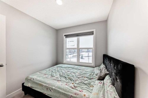 33 Savanna Manor Ne, Calgary, AB - Indoor Photo Showing Bedroom