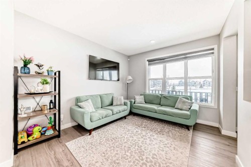 33 Savanna Manor Ne, Calgary, AB - Indoor Photo Showing Living Room