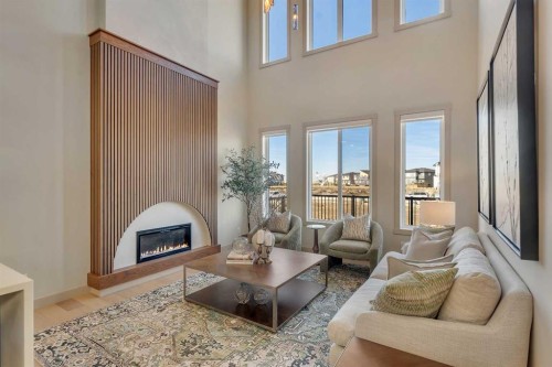 973 South Shore Terrace, Chestermere, AB - Indoor Photo Showing Living Room With Fireplace