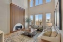 973 South Shore Terrace, Chestermere, AB  - Indoor Photo Showing Living Room With Fireplace 