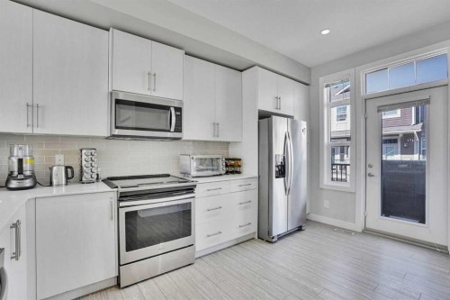 104 Legacy Path Se, Calgary, AB - Indoor Photo Showing Kitchen With Stainless Steel Kitchen