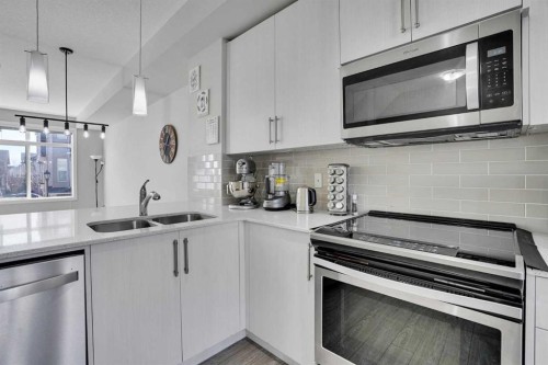 104 Legacy Path Se, Calgary, AB - Indoor Photo Showing Kitchen With Double Sink