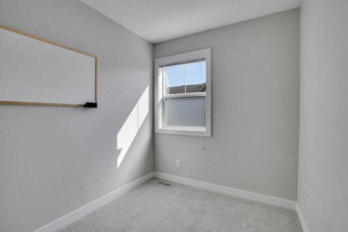 104 Legacy Path Se, Calgary, AB - Indoor Photo Showing Other Room