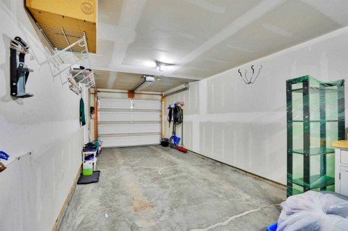 104 Legacy Path Se, Calgary, AB - Indoor Photo Showing Garage