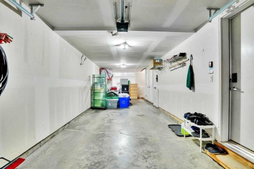 104 Legacy Path Se, Calgary, AB - Indoor Photo Showing Garage