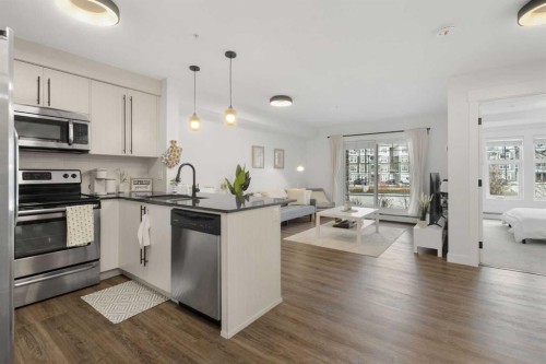 3107-11 Mahogany Row Se, Calgary, AB - Indoor Photo Showing Kitchen With Stainless Steel Kitchen With Upgraded Kitchen