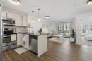 3107-11 Mahogany Row Se, Calgary, AB  - Indoor Photo Showing Kitchen With Stainless Steel Kitchen With Upgraded Kitchen 