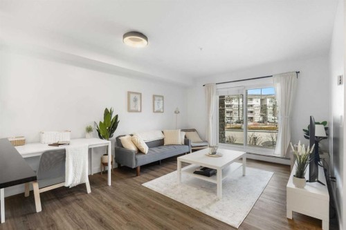 3107-11 Mahogany Row Se, Calgary, AB - Indoor Photo Showing Living Room
