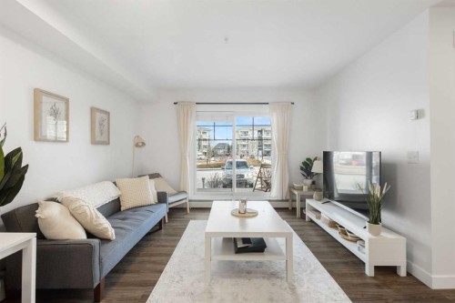 3107-11 Mahogany Row Se, Calgary, AB - Indoor Photo Showing Living Room