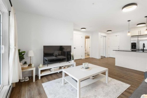 3107-11 Mahogany Row Se, Calgary, AB - Indoor Photo Showing Living Room