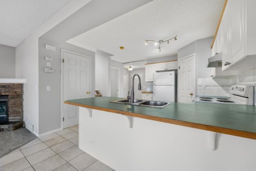 45 Country Hills Crescent Nw, Calgary, AB - Indoor Photo Showing Kitchen With Double Sink