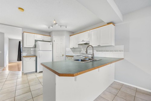 45 Country Hills Crescent Nw, Calgary, AB - Indoor Photo Showing Kitchen With Double Sink