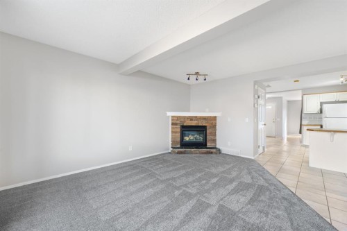 45 Country Hills Crescent Nw, Calgary, AB - Indoor Photo Showing Living Room With Fireplace