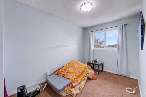 48 Whitworth Way Ne, Calgary, AB - Indoor Photo Showing Bedroom