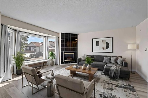 48 Whitworth Way Ne, Calgary, AB - Indoor Photo Showing Living Room With Fireplace