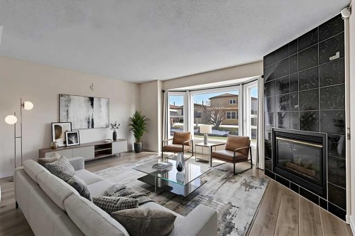 48 Whitworth Way Ne, Calgary, AB - Indoor Photo Showing Living Room With Fireplace